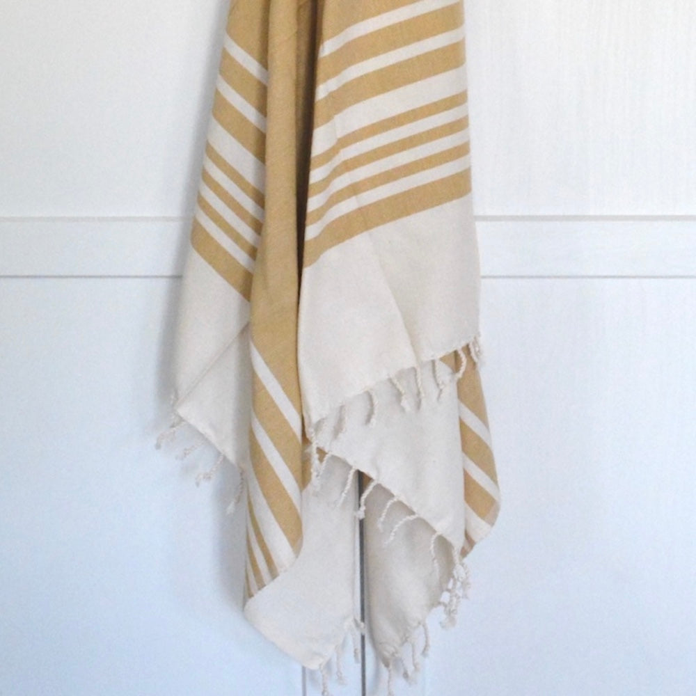 terraklay's tan bath towel handloomed in organic cotton.